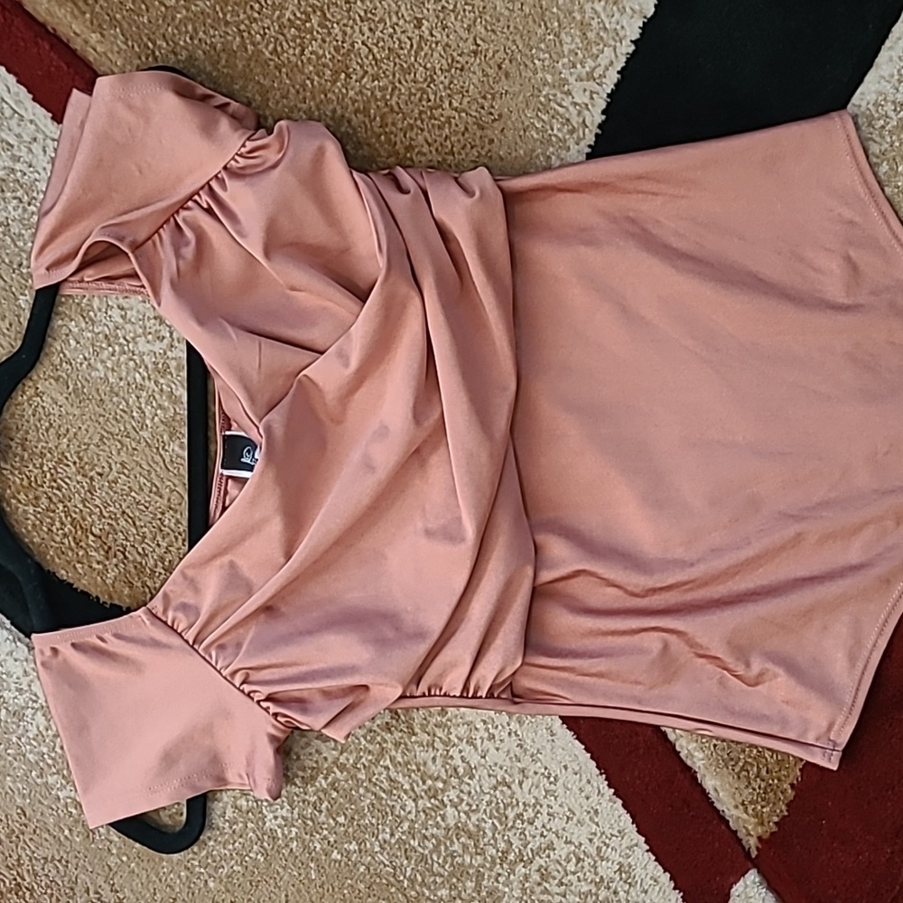 38 Leyva's Bodysuit